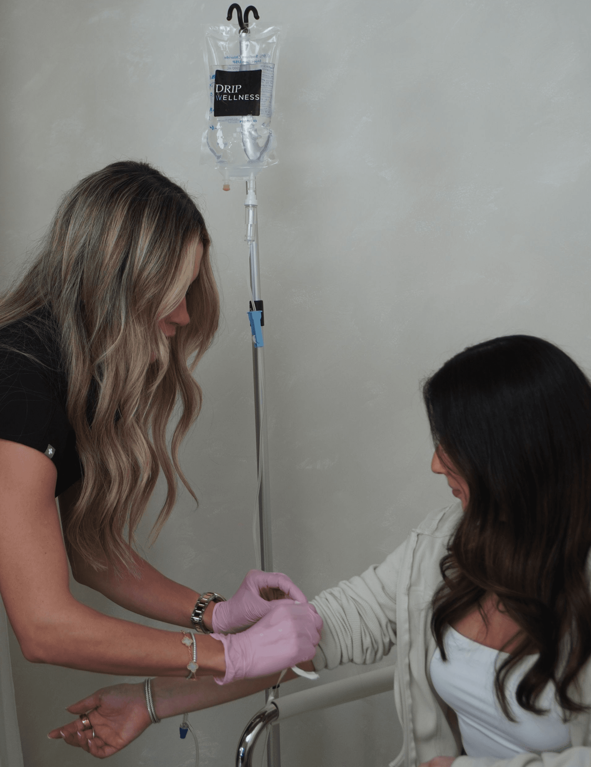 IV Therapy Nurses administering treatment to patient